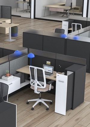 Individual workspace with adjustable desk, ergonomic chair and black and white storage spaces.